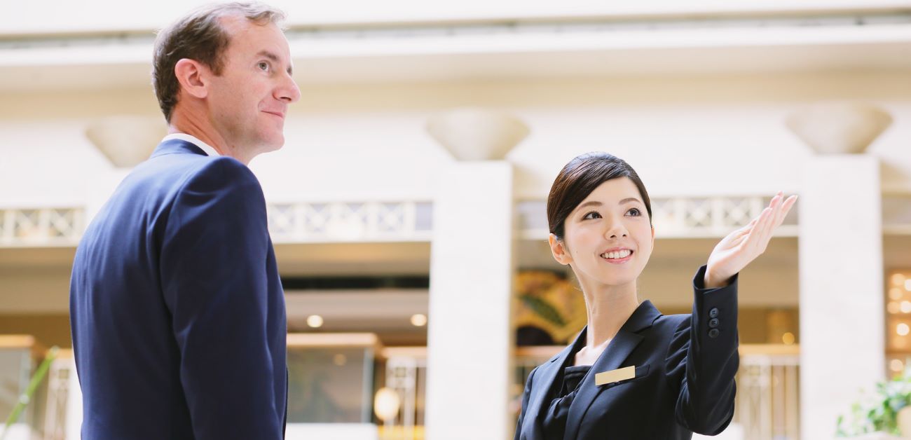 Hotel lobby consultation scene highlighting design planning and material selection