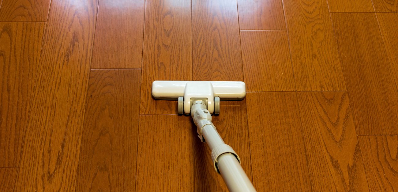 Maintenance tools on vinyl flooring demonstrating easy cleaning and low upkeep requirements