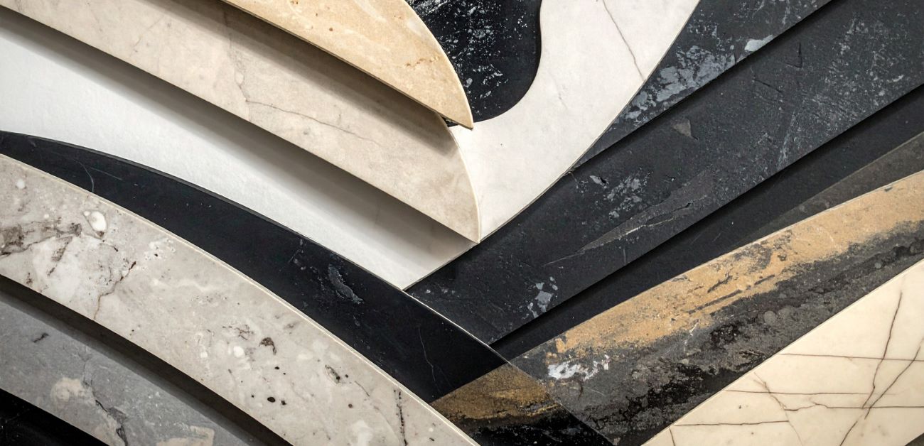 Close-up of layered feature wall materials highlighting texture and construction detail