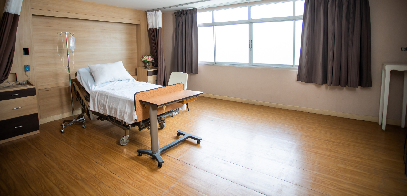 Patient room with vinyl flooring designed for comfort, safety, and easy cleaning