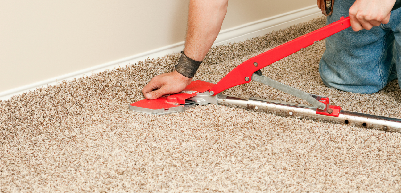 Carpet stretching and fitting process during hotel carpet installation