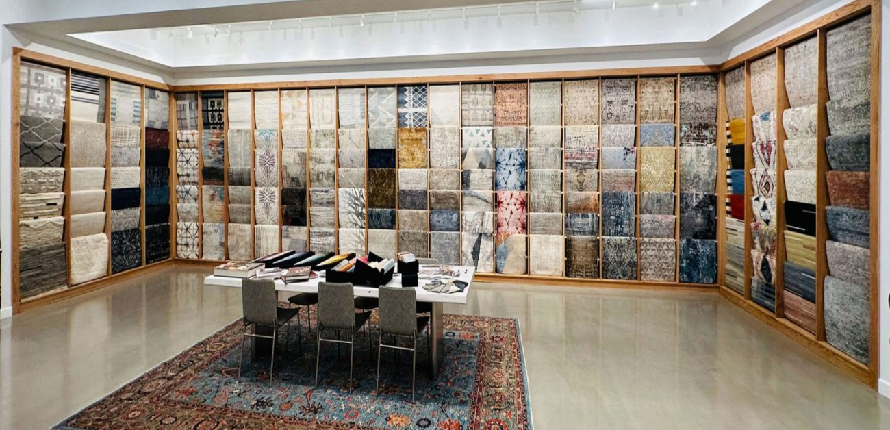 Large carpet showroom displaying hotel room carpet ranges for bulk supply
