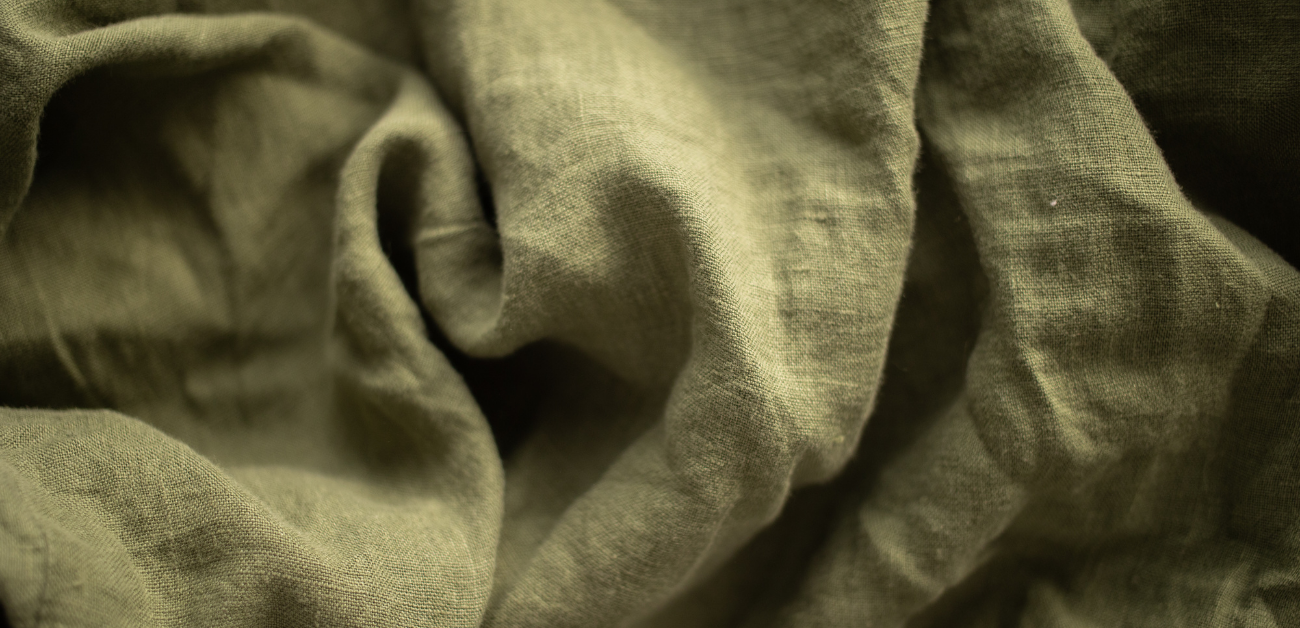Close-up of natural upholstery fabric highlighting texture and weave quality